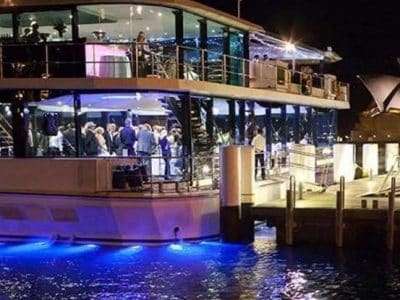 entertainment on a party boat in sydney harbour at night