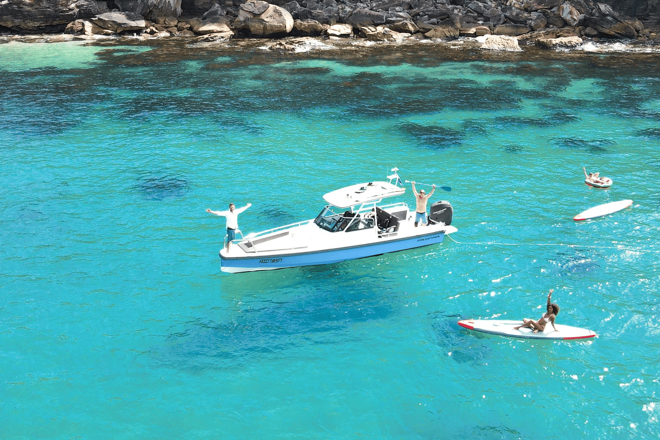 axopar self drive with paddleboards