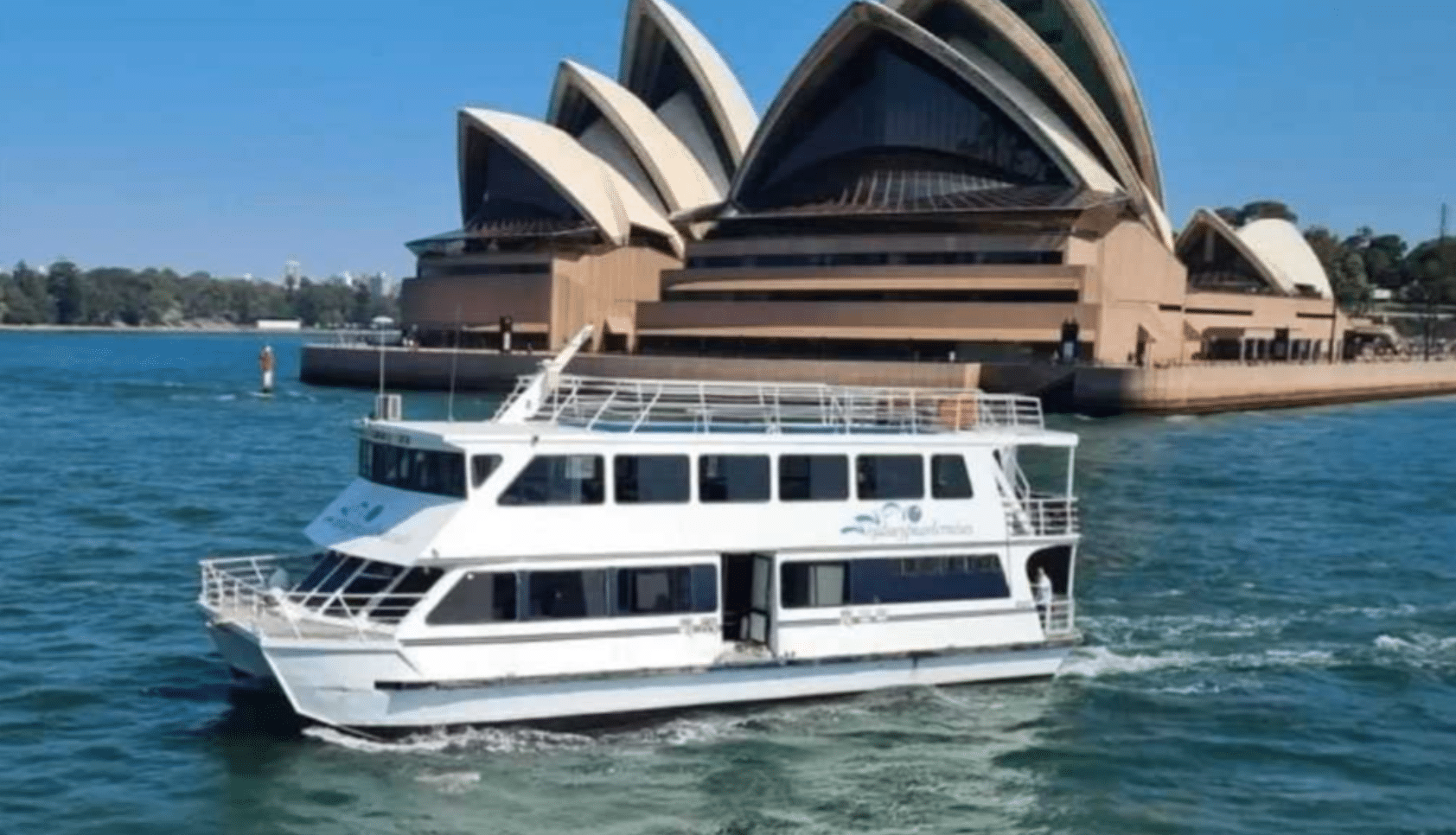 MV Pearl catamaran interior with panoramic harbour windows
