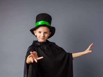 Little magician does tricks Little